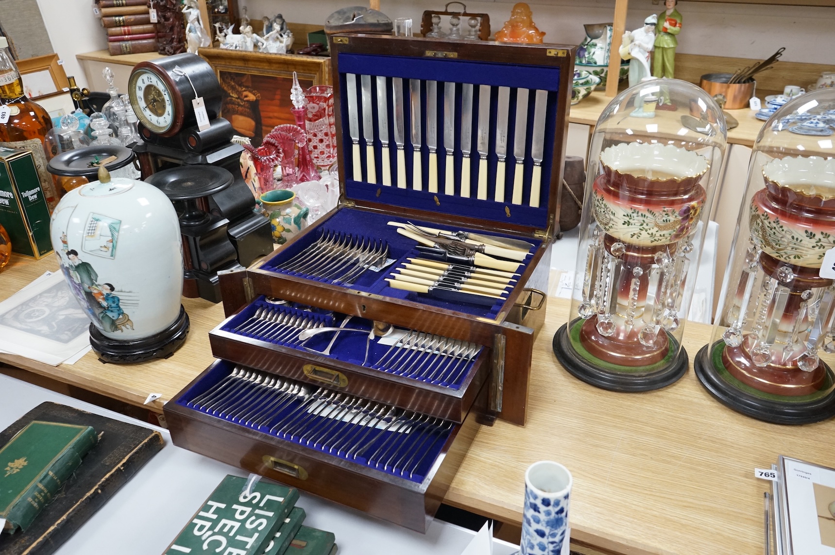 A Walker & Hall three-drawer canteen of plated cutlery. Canteen 48cm wide x 35cm deep x 24cm high. Condition - good